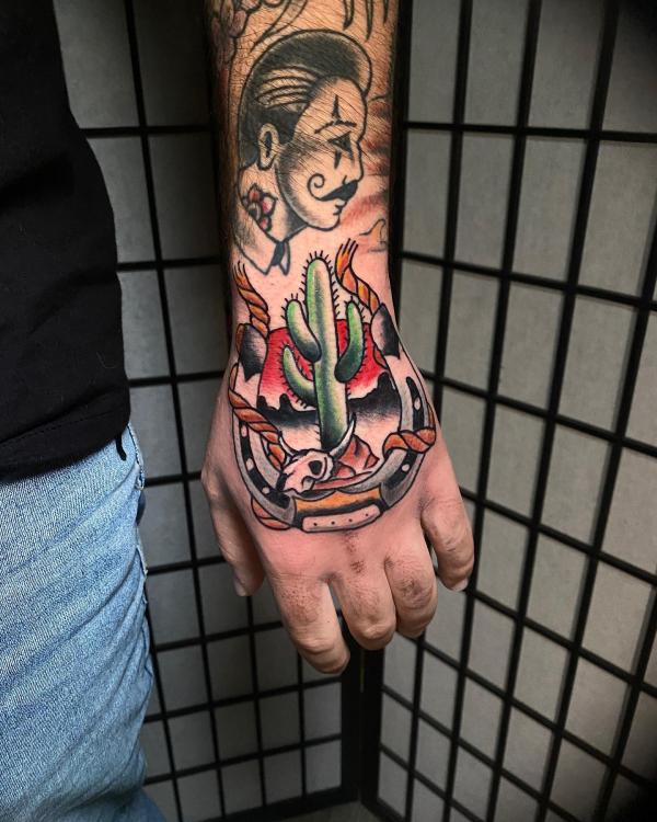 Traditional Cactus hand tattoo