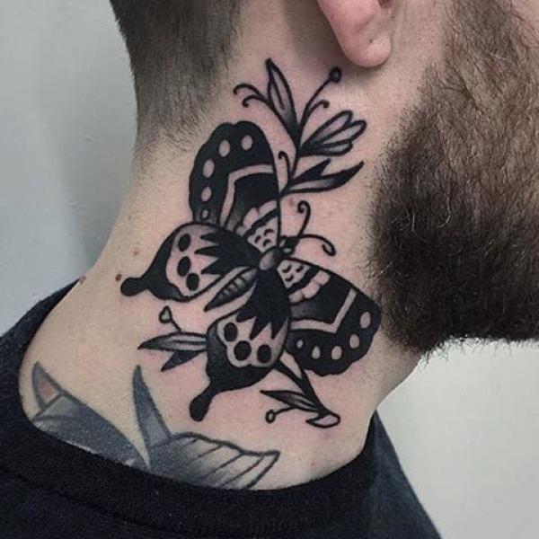 Traditional black and white butterfly neck tattoo 