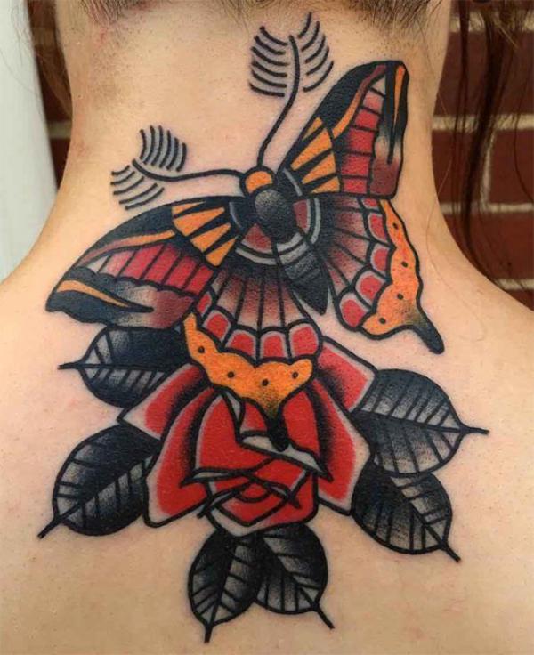 Traditional butterfly and rose on back of lower neck 