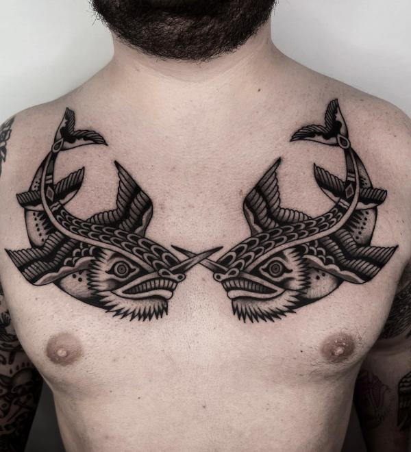 Traditional whale chest tattoo