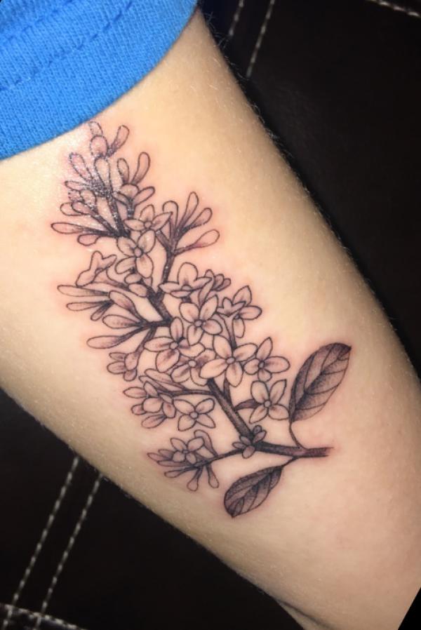 Vintage lilac line work tattoo