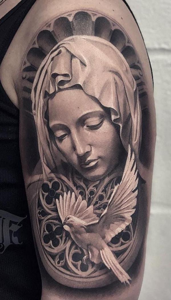 Virgin Mary and dove half sleeve tattoo