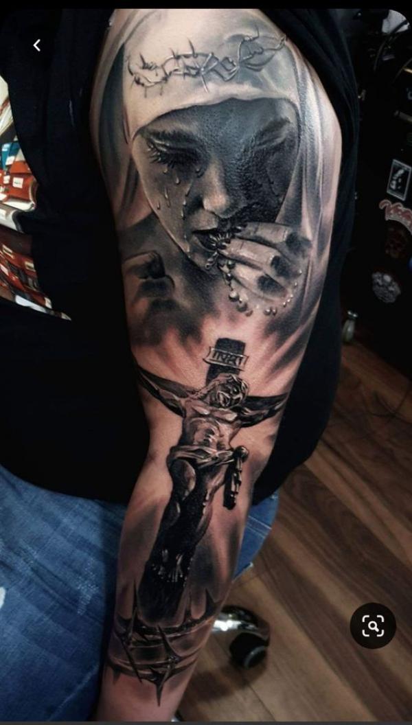 Virgin Mary looking down crucifixion of Jesus