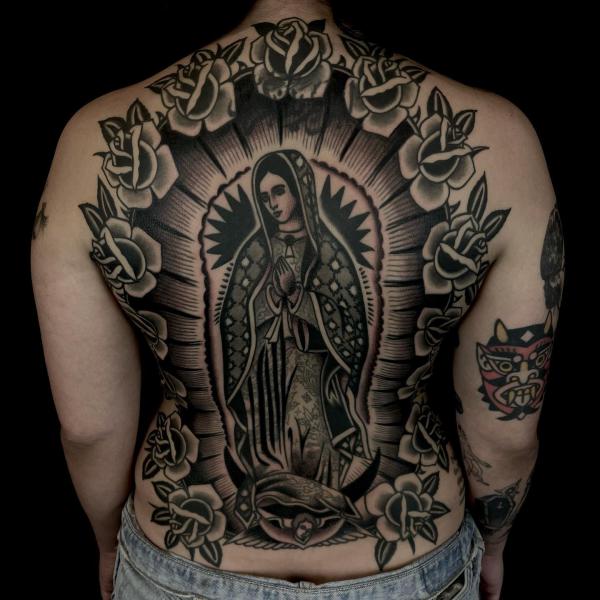 Virgin Mary surrounded by roses