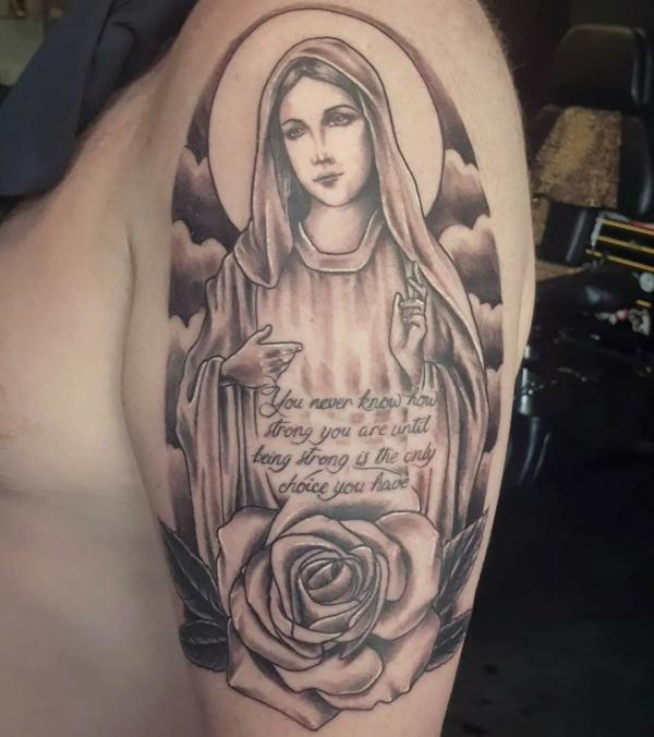 Virgin Mary tattoo with quote