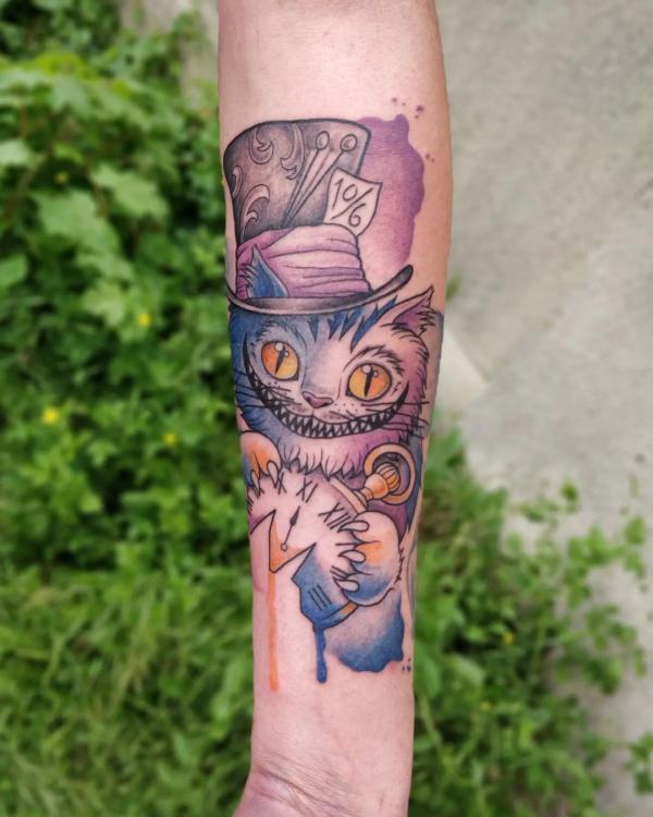Watercolor Cheshire Cat and broken half clock tattoo