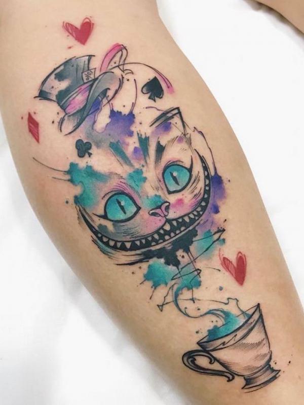 Watercolor Cheshire Cat and cup tattoo