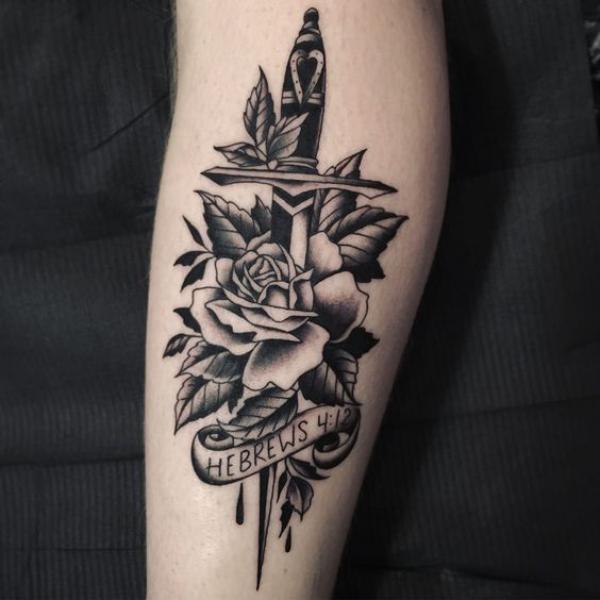 A dagger pierced a rose with banner bearing words Hebrews 4.12