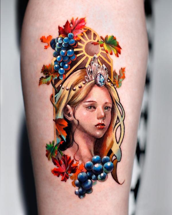 A girl portrait adorned with grapes and leaves