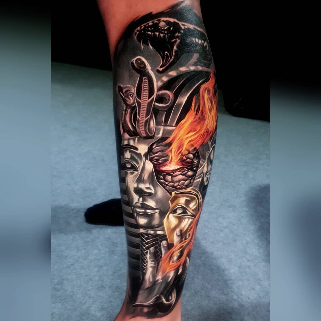 Abstract Tutankhamun and Cobra lower leg tattoo