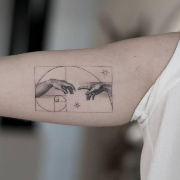 Adam hands and Fibonacci Sequence curve tattoo