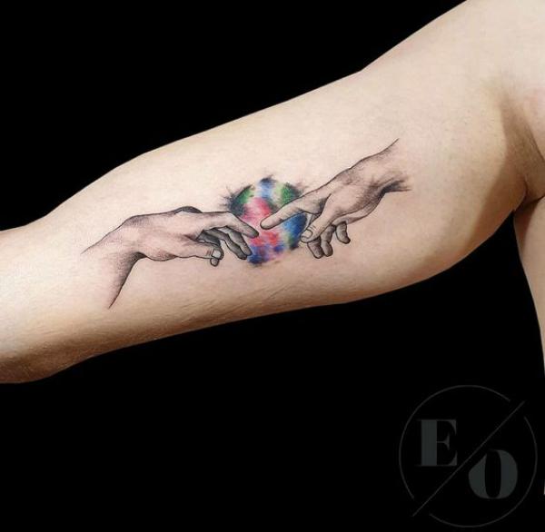 Adam hands with colored sphere