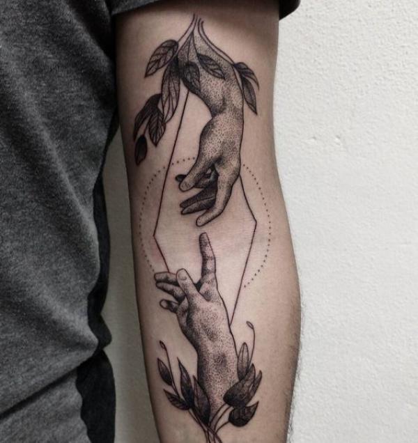 Adam hands with leaves tattoo