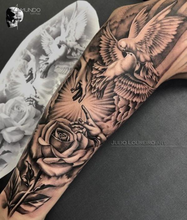 Adam hands with rose and dove leg tattoo
