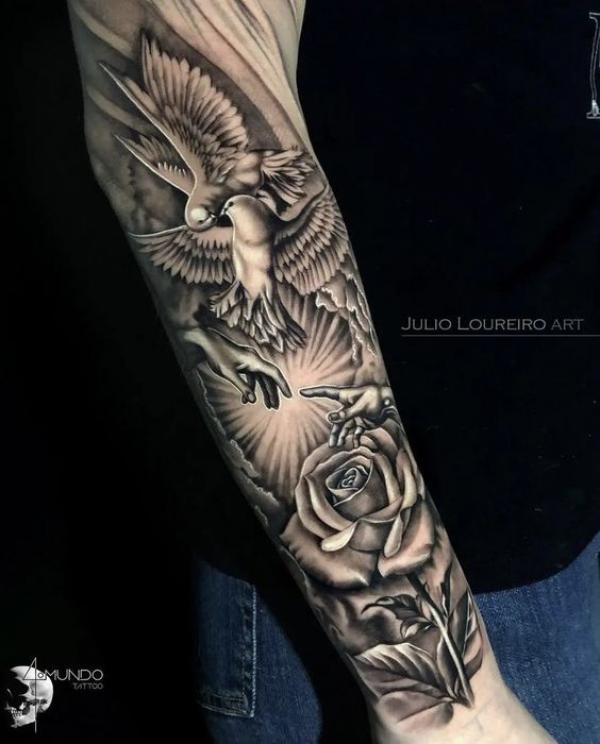 Adam hands with rose and dove tattoo