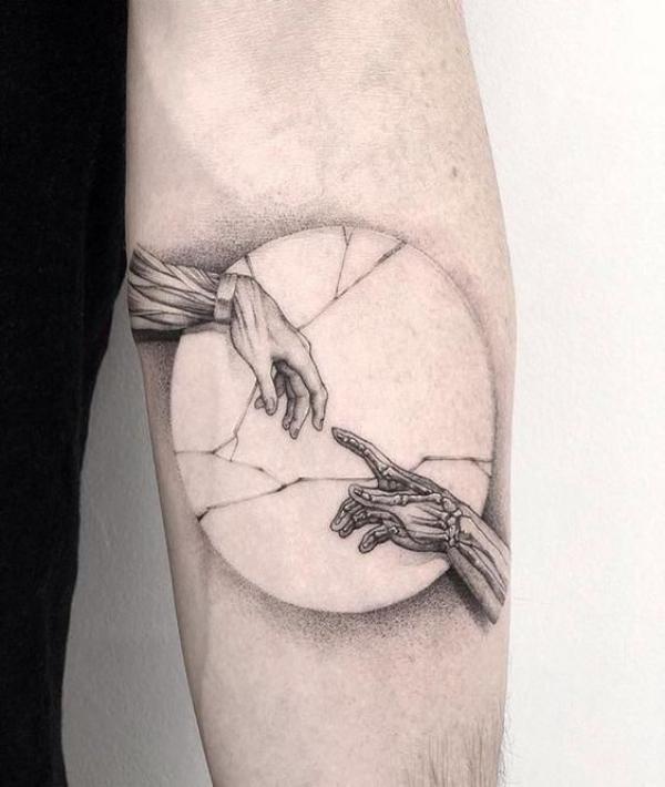 Adam skeleton hand tattoo