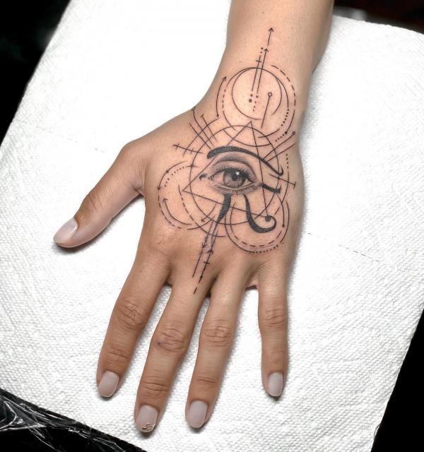 All seeing eye of Horus hand tattoo