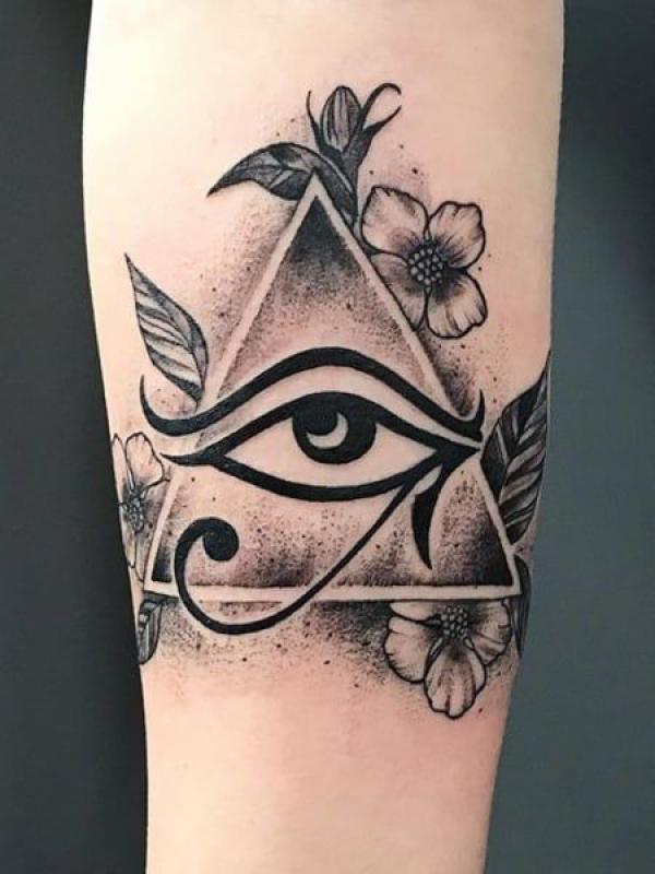 All seeing eye of Ra with flower tattoo