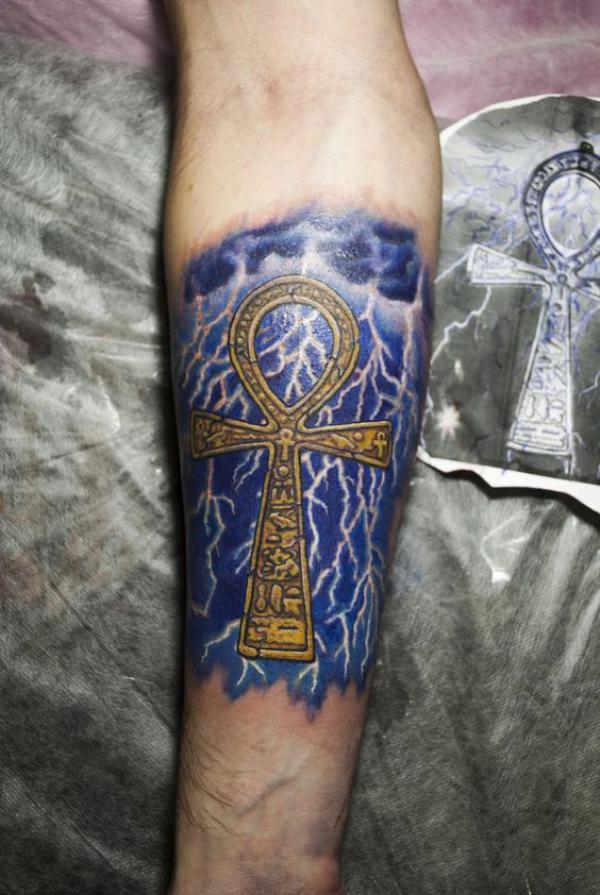 Ankh and lightning tattoo