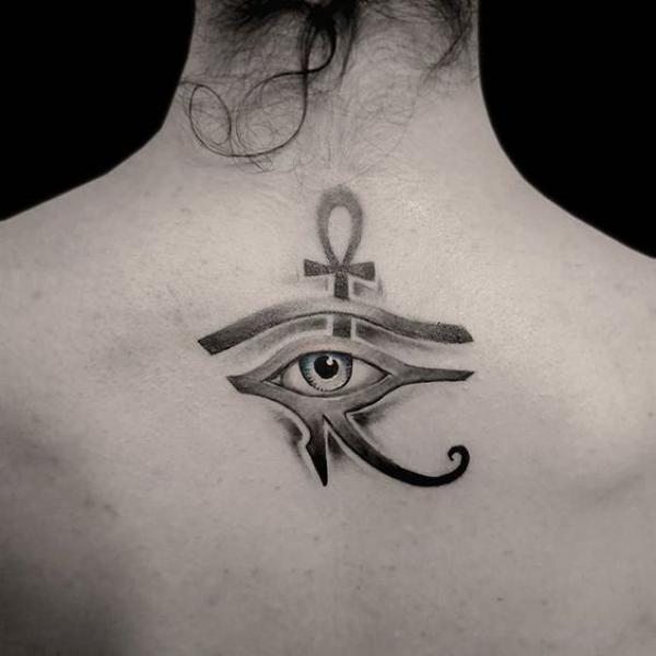 Ankh cross and eye of Horus back tattoo