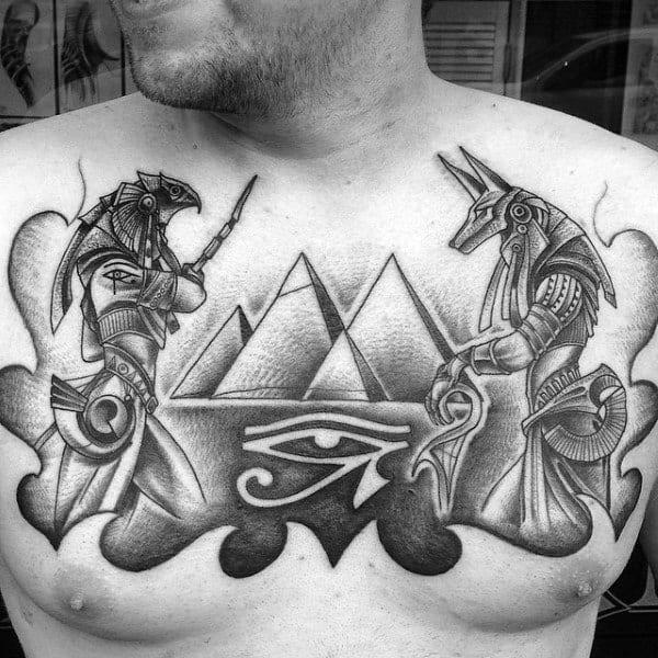 Anubis and Horus with eye of Ra and Pyramids chest tattoo