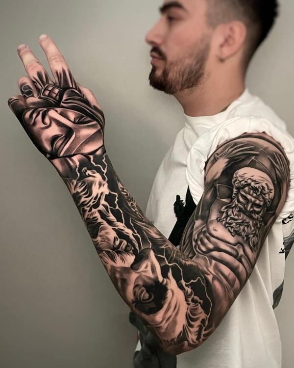 Atlas and Virgin Mary full sleeve tattoo
