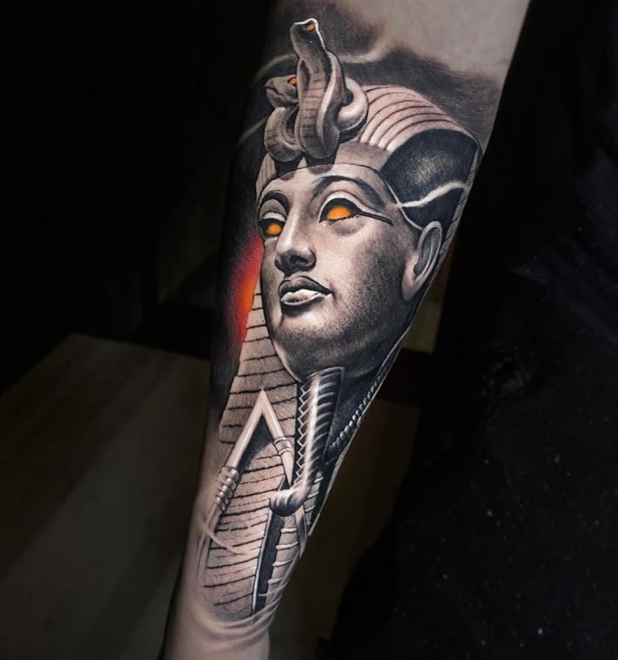 Black and grey King Tut statue tattoo