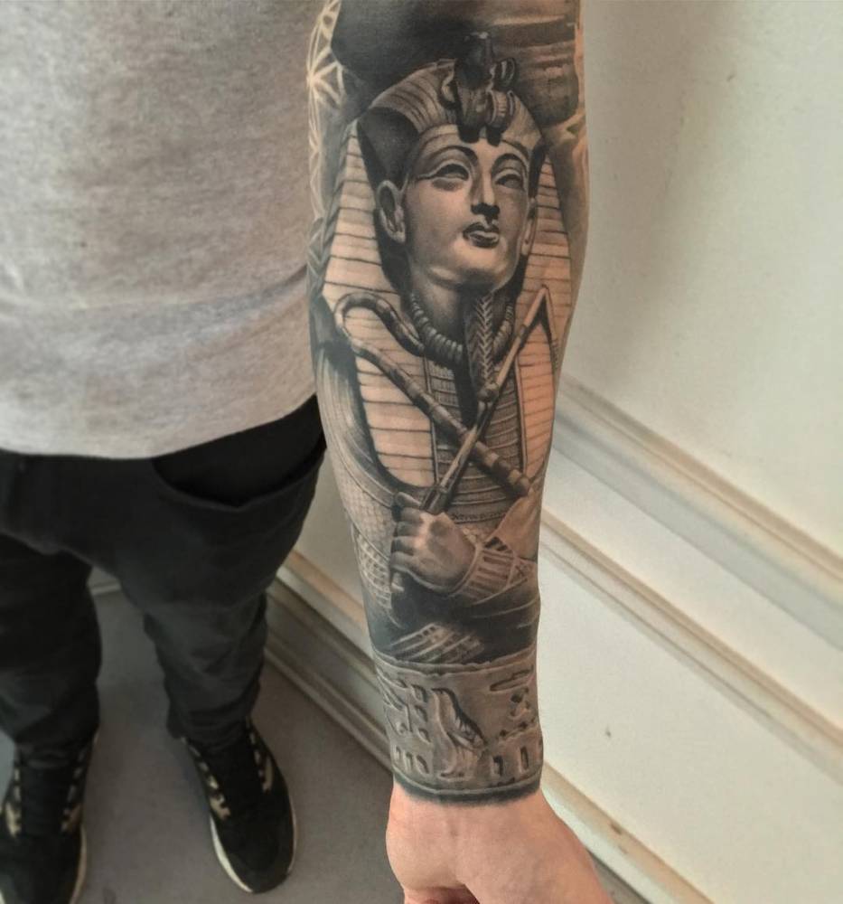 Black and grey Tutankhamun forearm tattoo