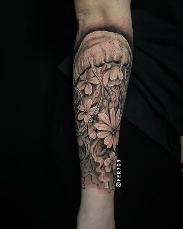 Black and grey jellyfish and flower tattoo