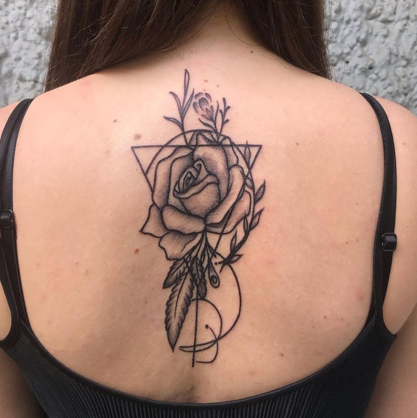 Black and grey rose and triangle tattoo on back