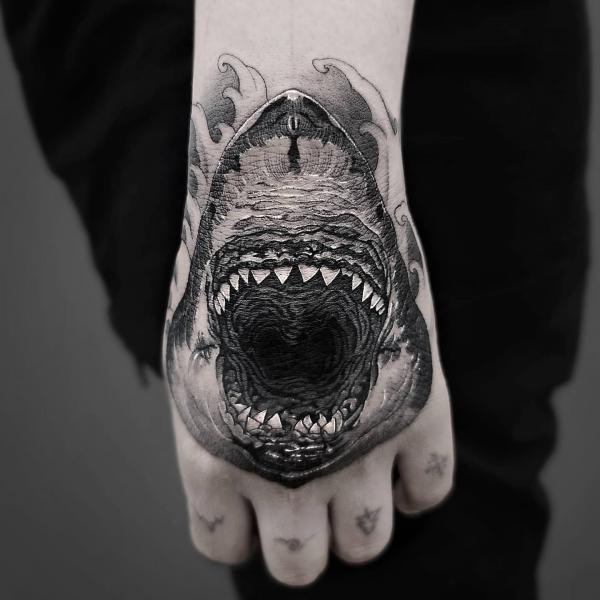 Black and grey shark head hand tattoo