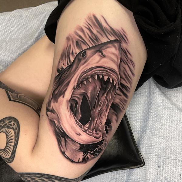 Black and grey shark head thigh tattoo