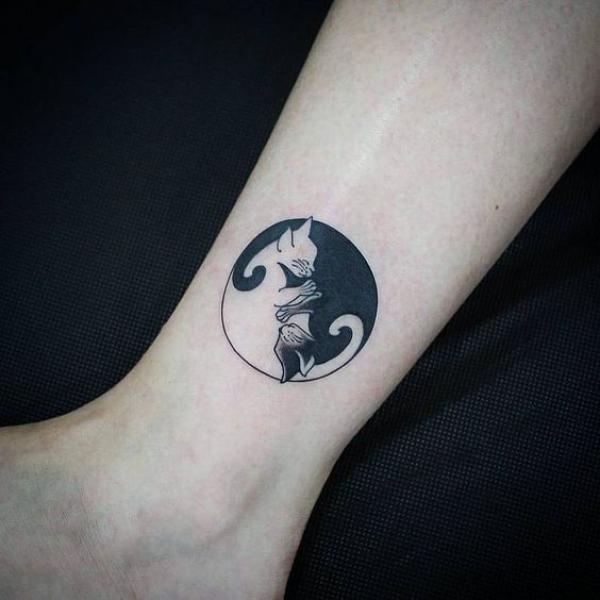 Black and white cats Yin Yang tattoo