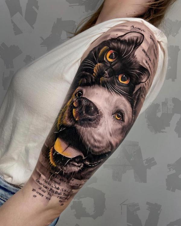 Black cat and dog tattoo sleeve