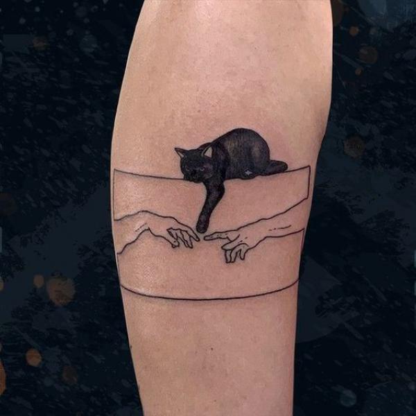 Black cat and the creation of adam tattoo