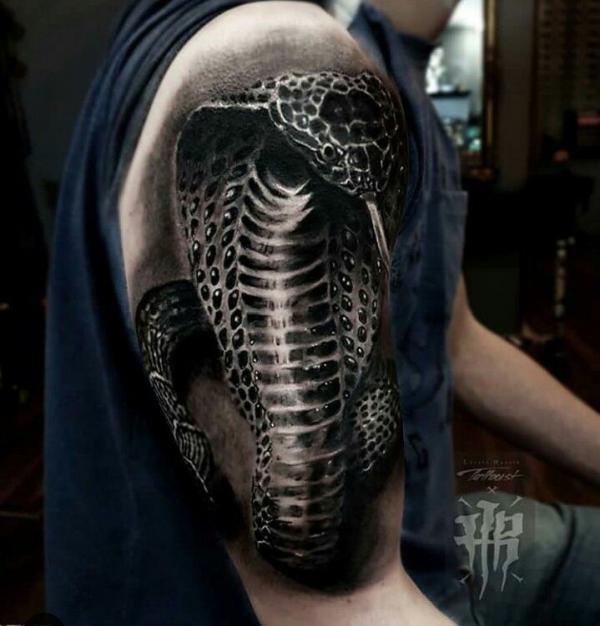 Blackwork cobra half sleeve tattoo