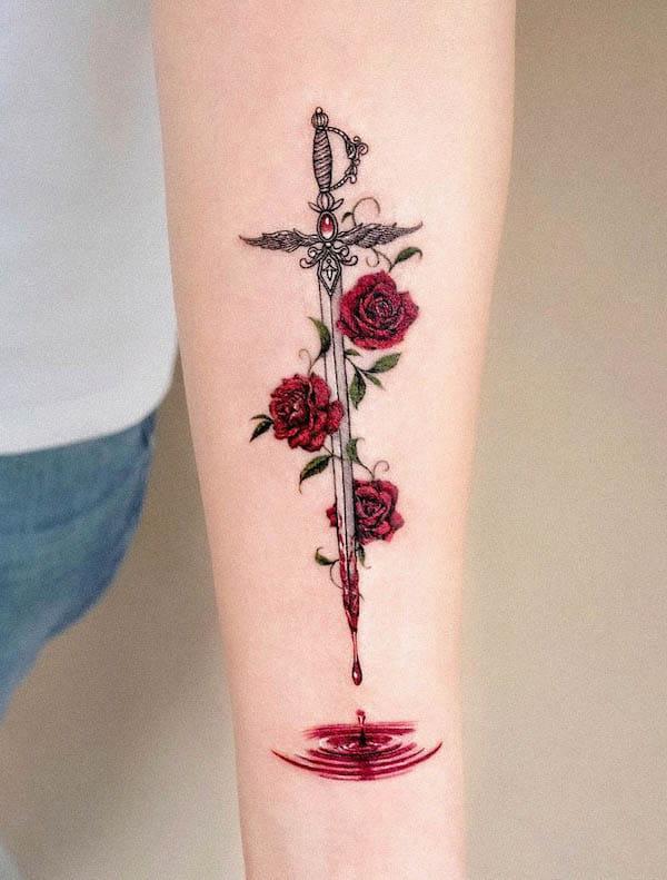 What Does A Dagger And Rose Tattoo On The Hand Mean?