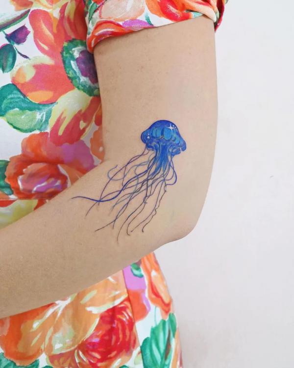 Blue Jellyfish with star tattoo