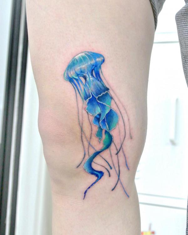 Blue jellyfish tattoo