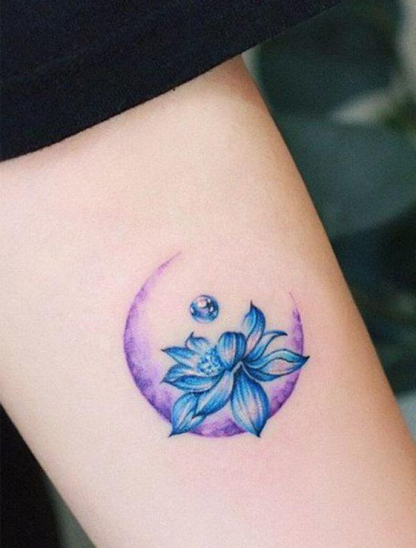 Blue lotus and crescent moon tattoo