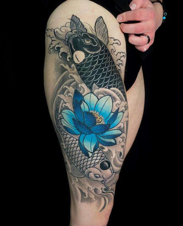 Blue lotus and greyscale koi fish tattoo