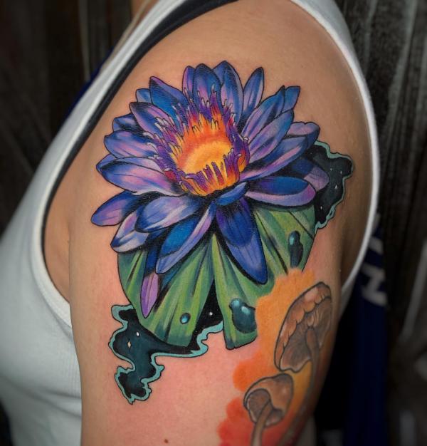 Blue lotus and leaf with mushroom tattoo