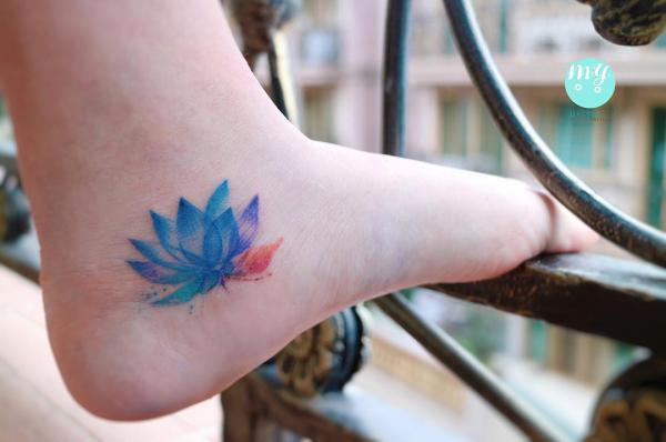 Blue lotus foot tattoo