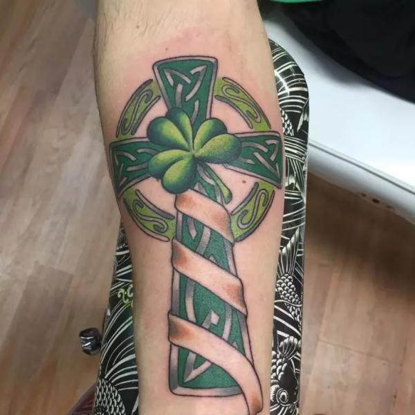 Celtic cross with shamrock tattoo