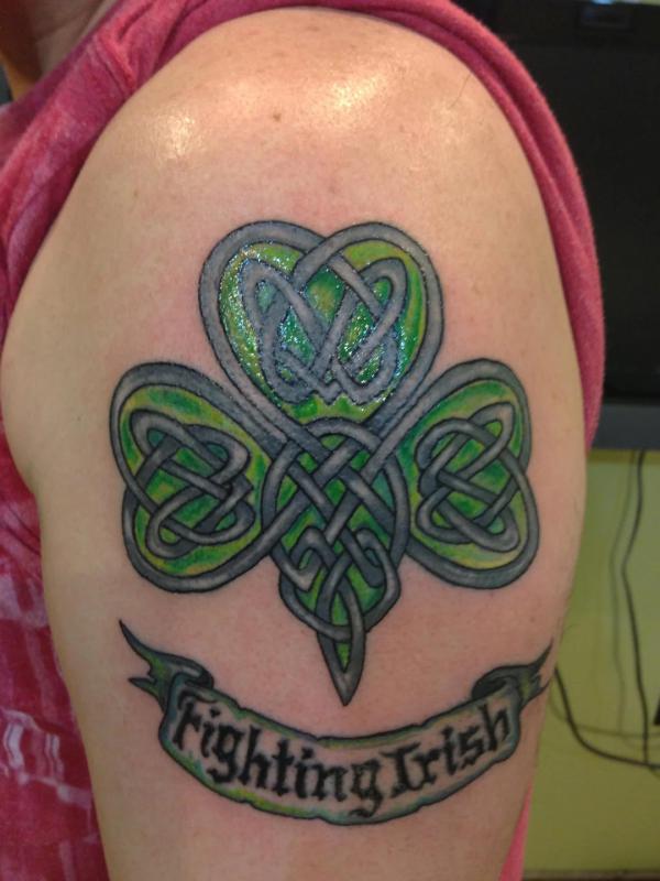 Celtic knot clover tattoo with phrase Fighting Irish