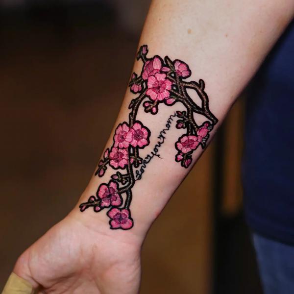 Cherry blossom patch tattoo