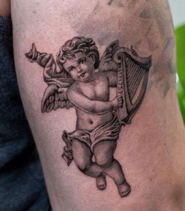 Cherub With Harp tattoo