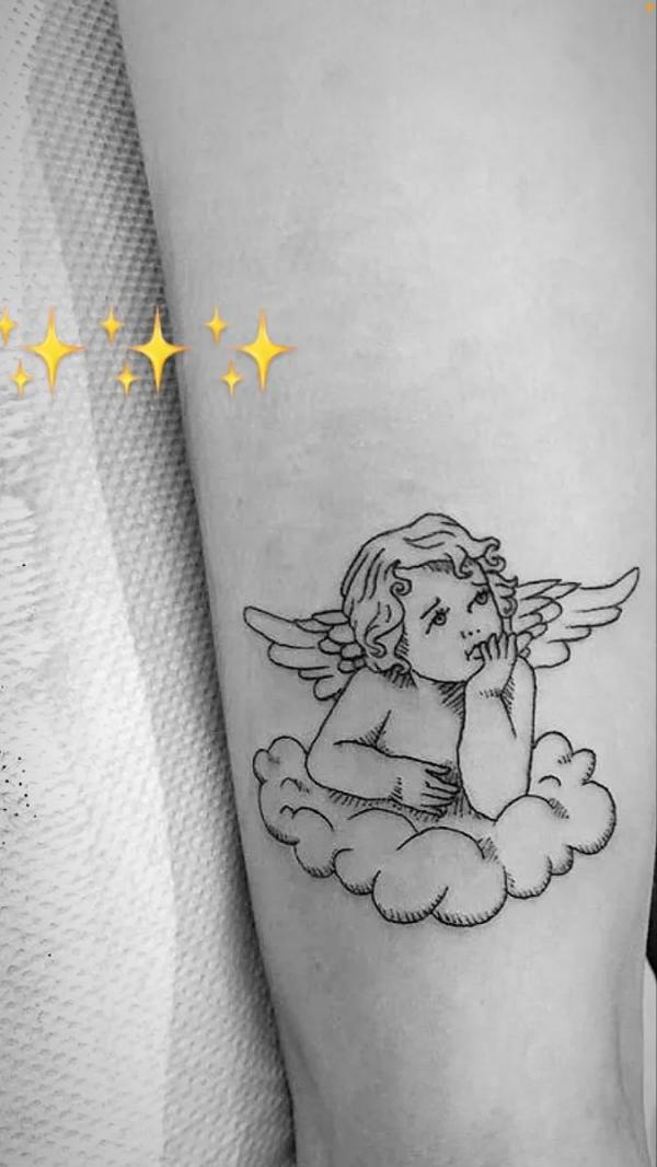 Cherub and cloud tattoo