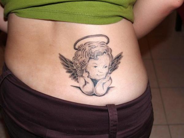 Cherub low back tattoo