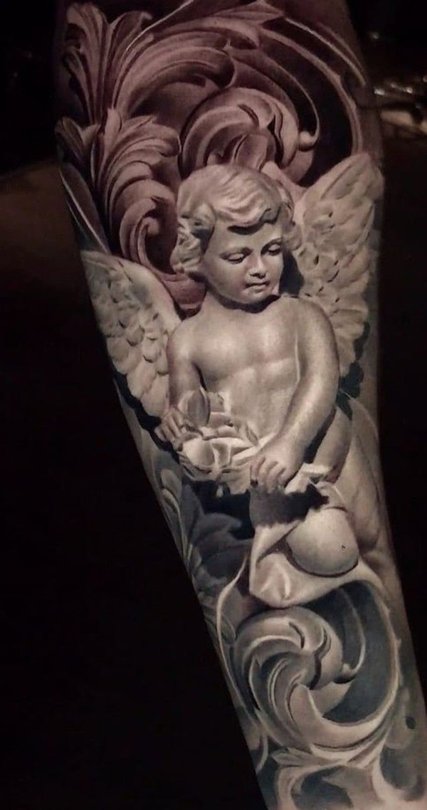 Cherub statue tattoo